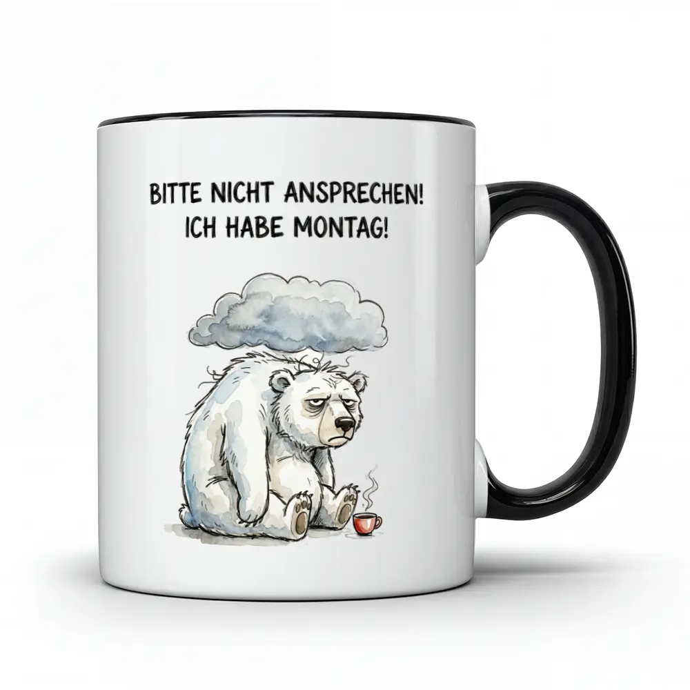 Weiße Kaffeetasse mit schwarzem Rand und Henkel, auf der ein trauriger, müder Eisbär mit einer kleinen roten Tasse und einer dunklen Regenwolke über dem Kopf abgebildet ist. Darüber steht der deutsche Text 'BITTE NICHT ANSPRECHEN! ICH HABE MONTAG!'.